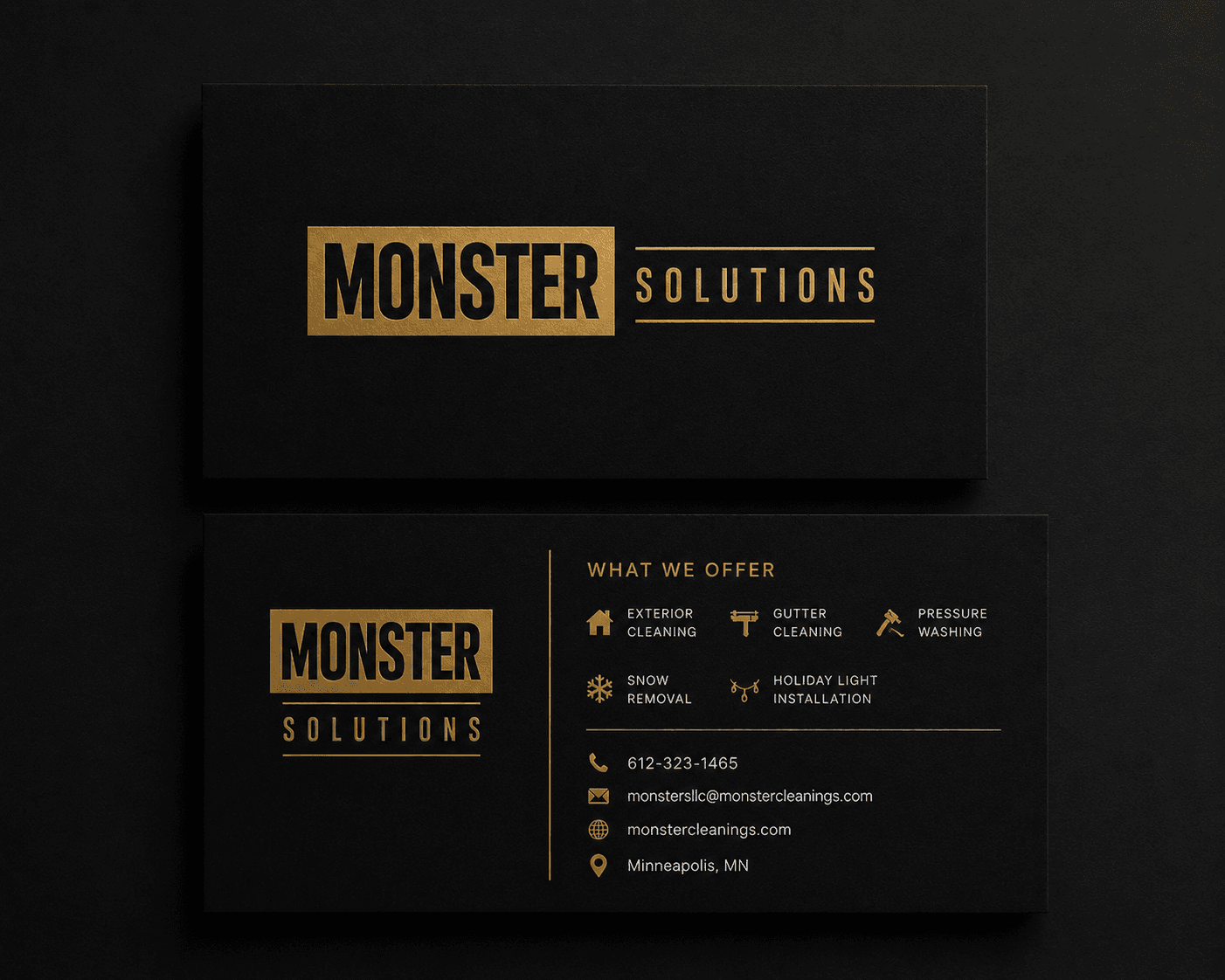 Monster Solutions black and gold brand card